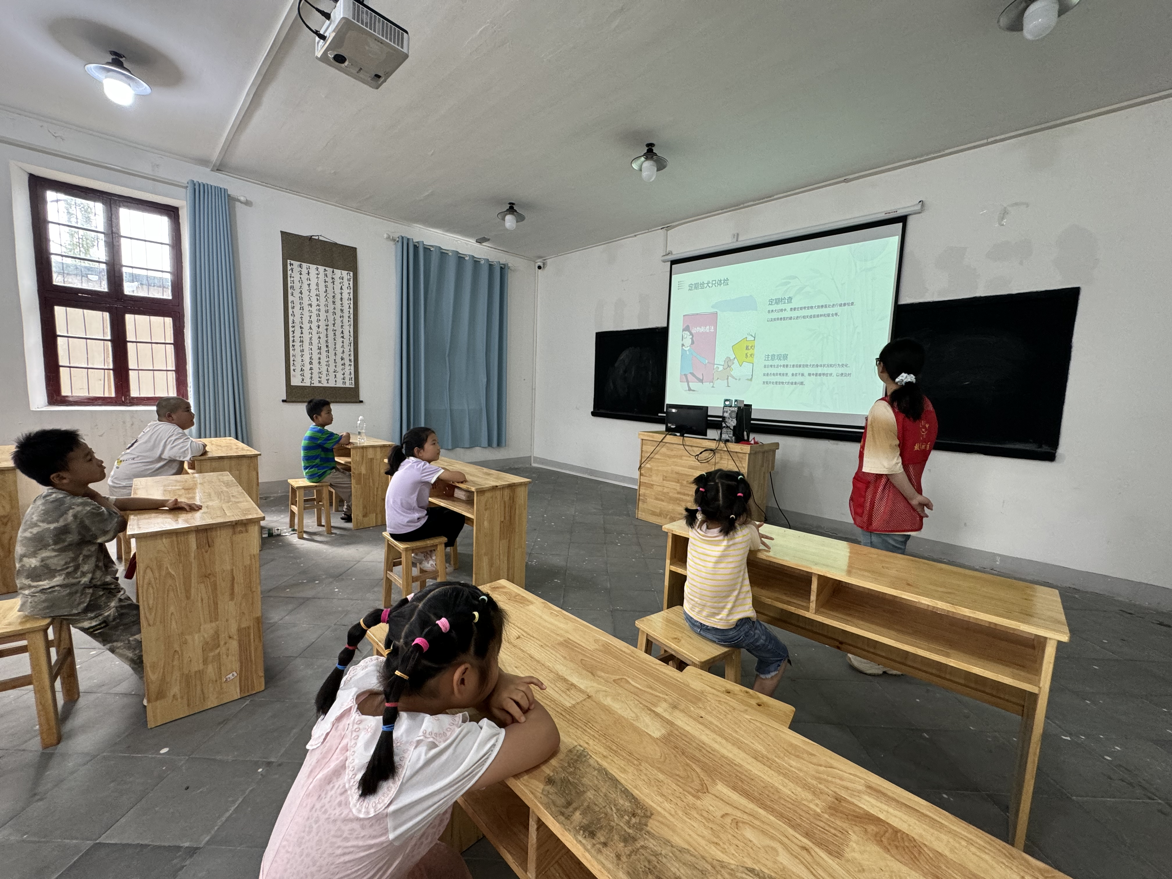 7月19日,鼓楼社区新时代文明实践站开展“文明养犬你我他，平安社区靠大家”文明养犬宣传活动2.png